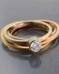 potrójna obrączka, złoto w 3 kolorach, pierścionek z brylantem