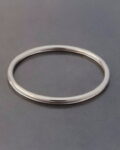 delikatna obrączka z białego złota próby 585 o profilu okrągłym 1 mm